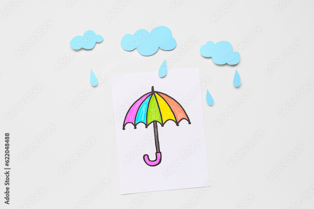 Drawn umbrella with paper clouds and rain drops on white background. Weather forecast concept