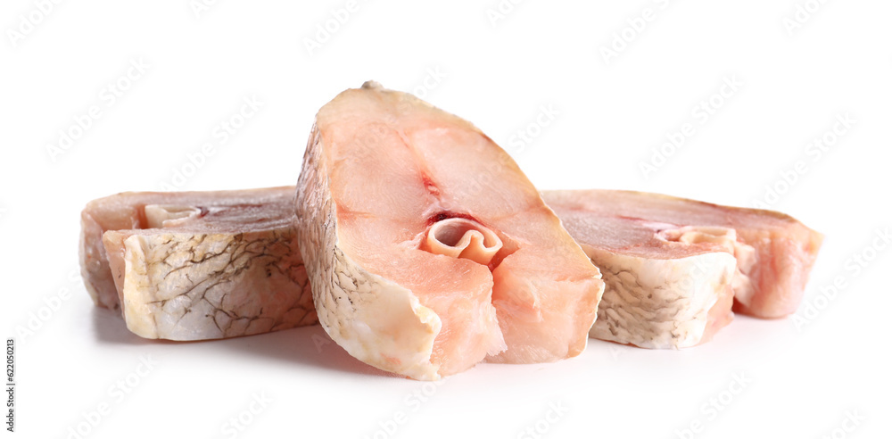 Pieces of raw codfish on white background