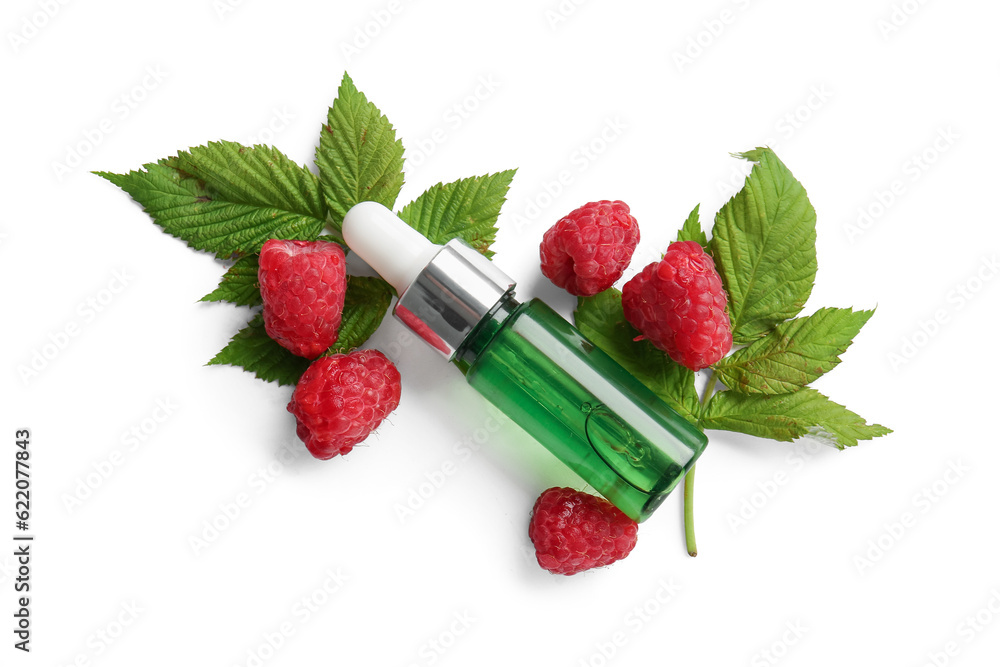 Bottle of cosmetic raspberry oil on white background