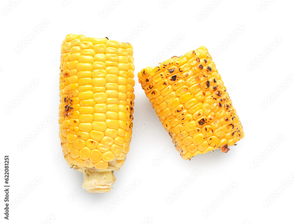 Cut tasty grilled corn cob on white background