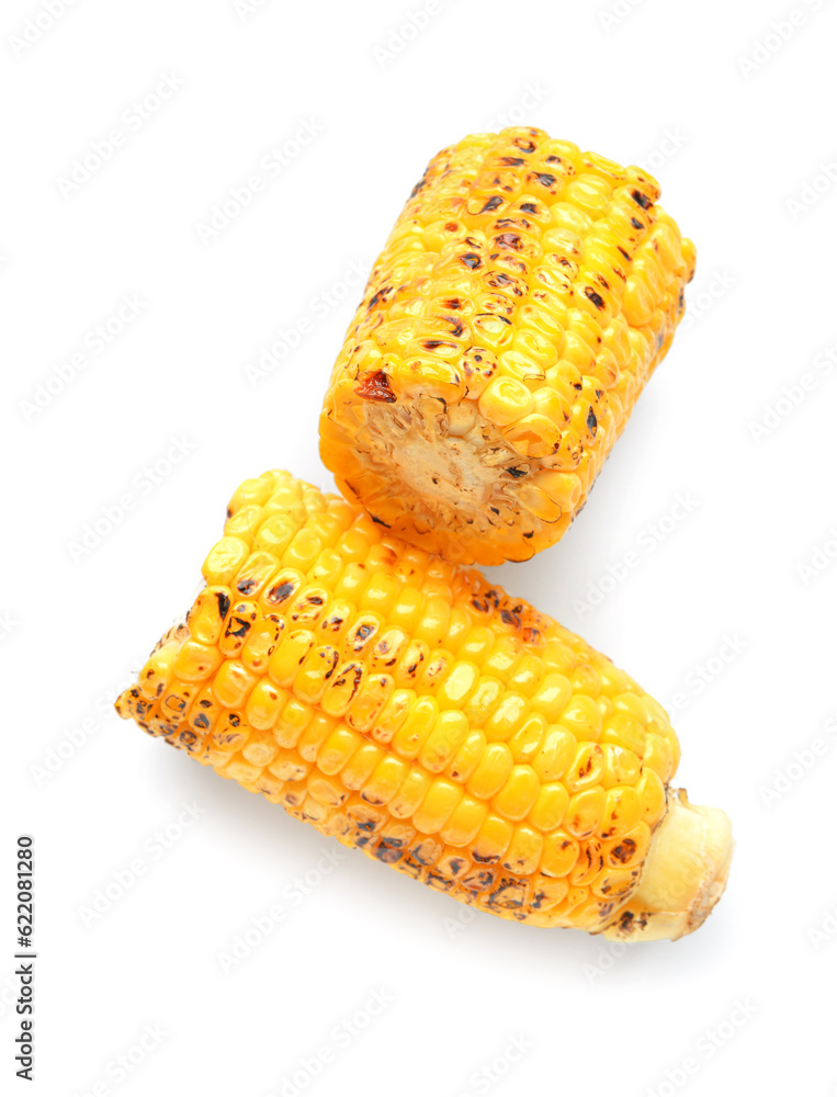 Cut tasty grilled corn cob on white background