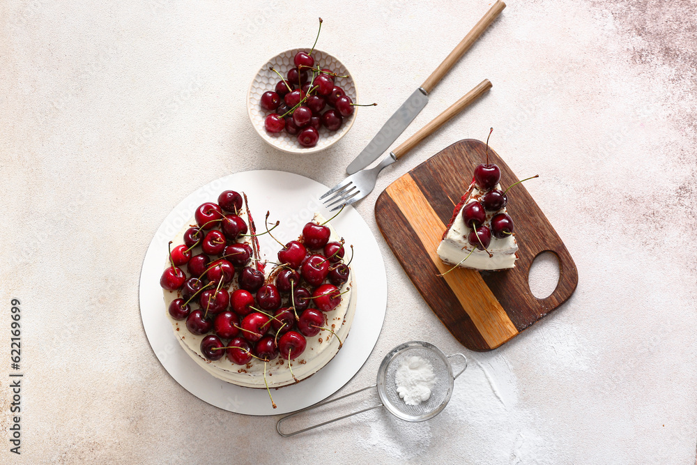 Tasty cherry cake on light background