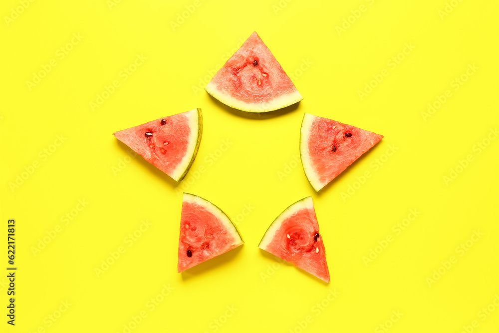 Frame made of fresh watermelons on yellow background