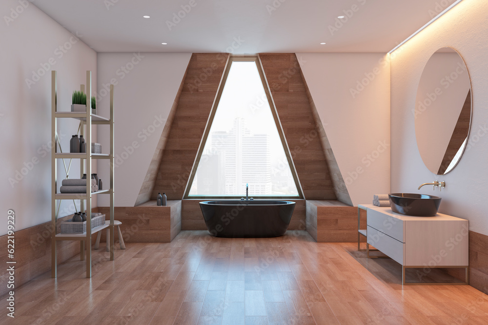 Front view on spacious bathroom with black bath on glossy parquet floor near stylish triangle window