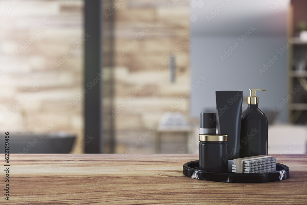 Front view of empty wooden tabletop in bathroom interior with blurred background and black bathroom 