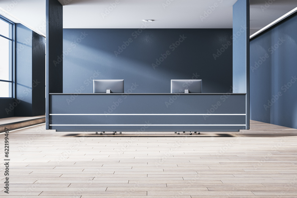 Modern concrete office lobby interior with reception desk and computer, wooden flooring, window with