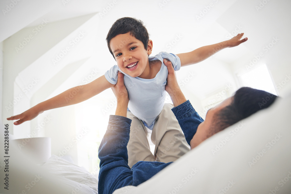 Airplane, portrait and boy child with father on a bed with love, bonding and having fun with game at