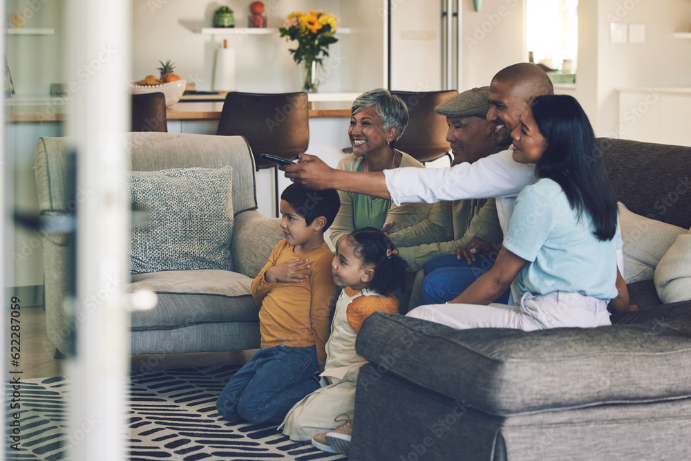 Family, kids and watching tv on sofa with grandparents, parents or remote control for choice in home