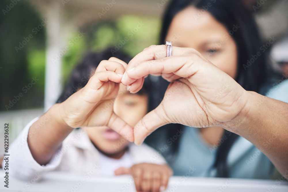 Mother, child and heart hands for love, care or compassion together in the outdoors. Mom and little 