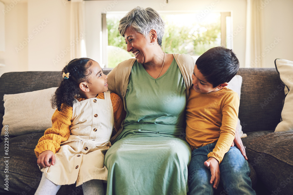 Laughing, grandmother or happy kids on a sofa with love enjoying quality bonding time together in fa