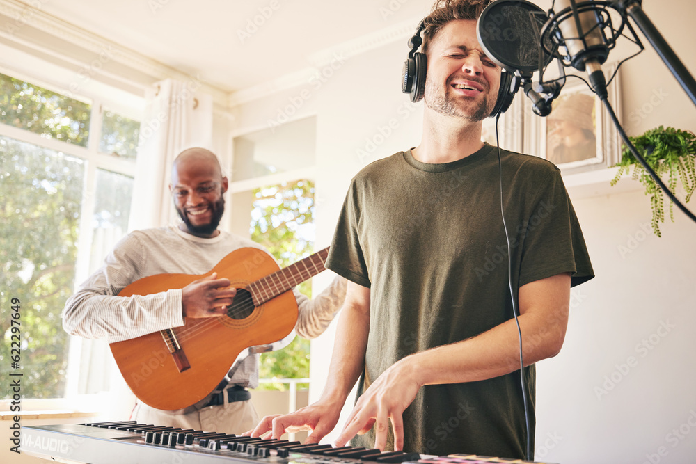 Piano, microphone and friends singing with guitar in home studio together. Electric keyboard, acoust