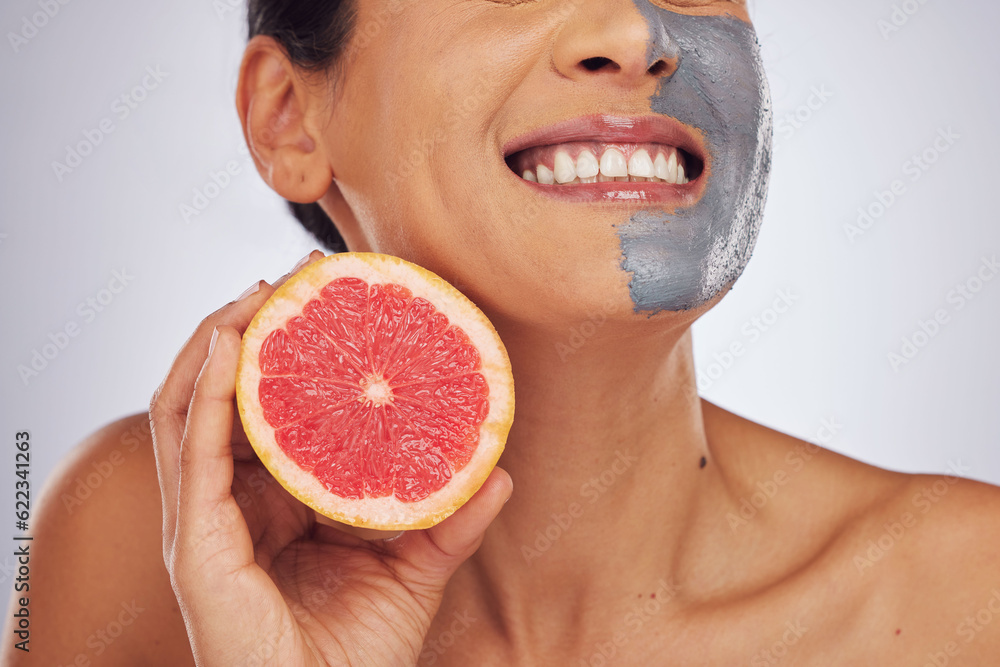 Skincare, grapefruit and woman with a face mask with charcoal, clay or natural beauty product for we