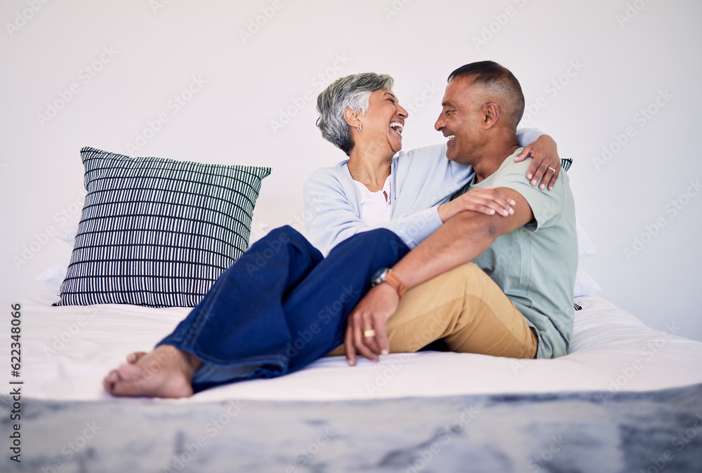 Hug, bedroom and laughing senior couple bonding, talking and enjoy quality time, funny conversation 