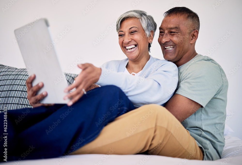 Bed, tablet and happy elderly couple laughing at funny social network blog, email or watch comedy vi