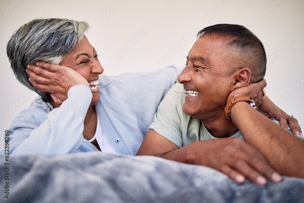 Love, bedroom face and elderly couple laugh, bond and enjoy quality time together, funny conversatio