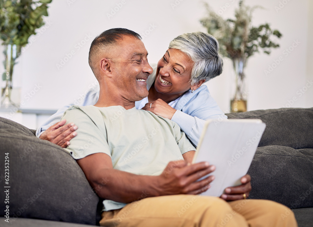 Love, happy and senior couple with tablet on the sofa networking on social media or the internet. Sm