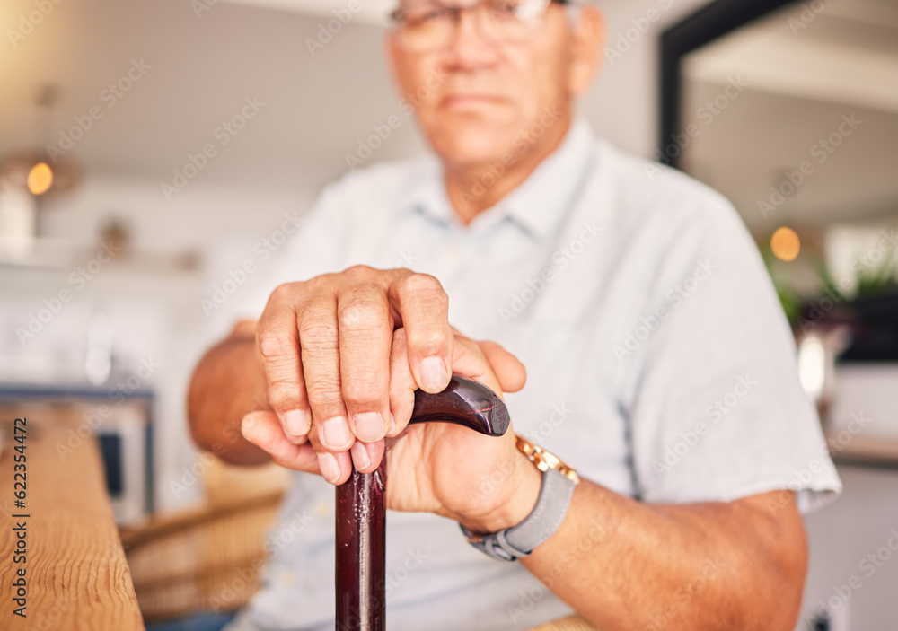 Hands, serious and portrait of a man with a cane for medical help, senior support and health. Sad, h