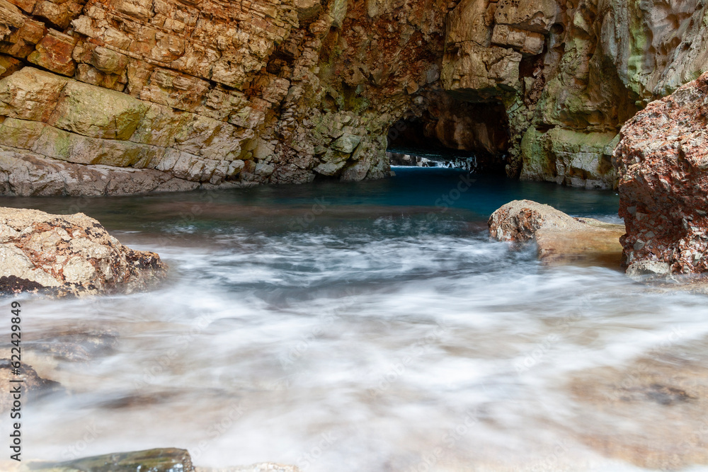 Inside a cave on the island of Hvar with the sea. Long exposure used. Croatia, Europe.