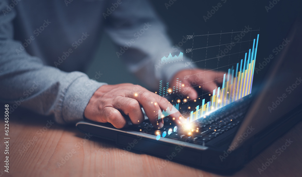 Business data analysis and project management concept, Businessman using laptop computer to analyze 