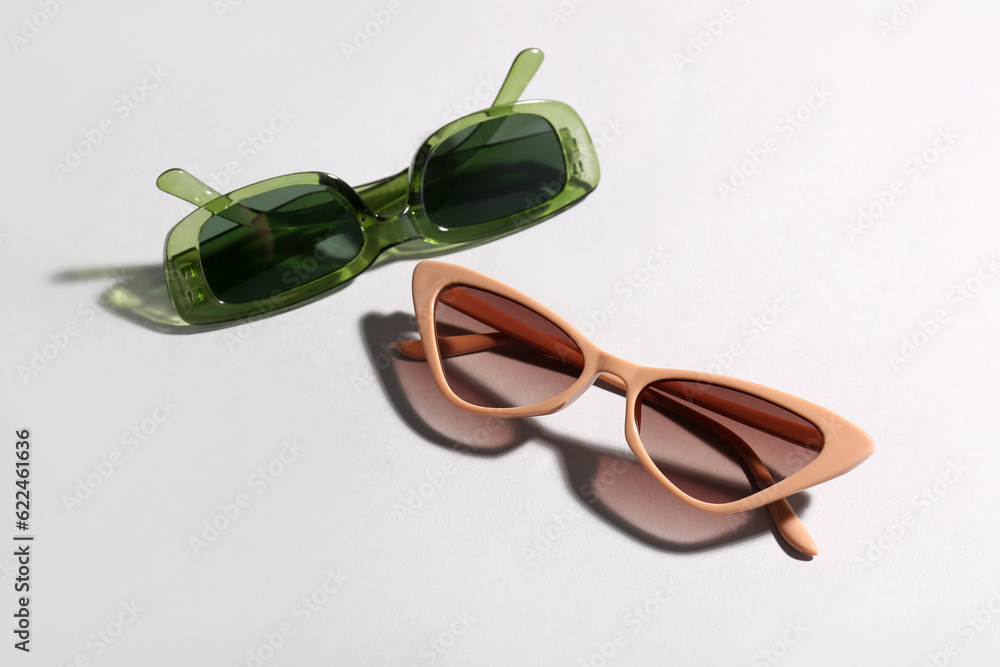 New stylish eyeglasses on white background