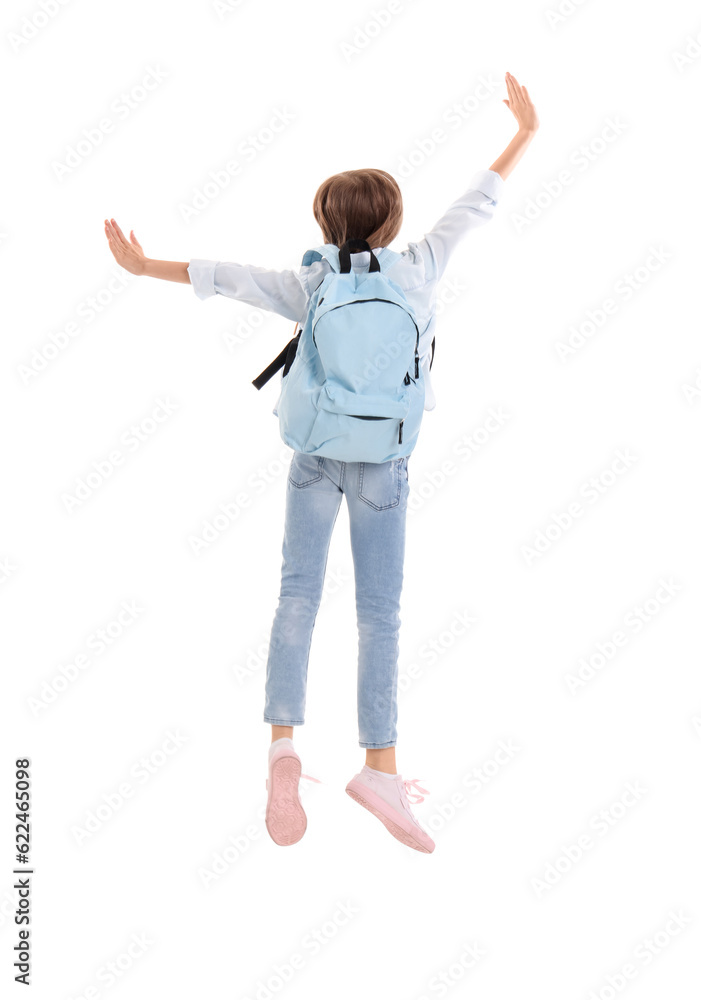 Jumping little girl with schoolbag on white background, back view