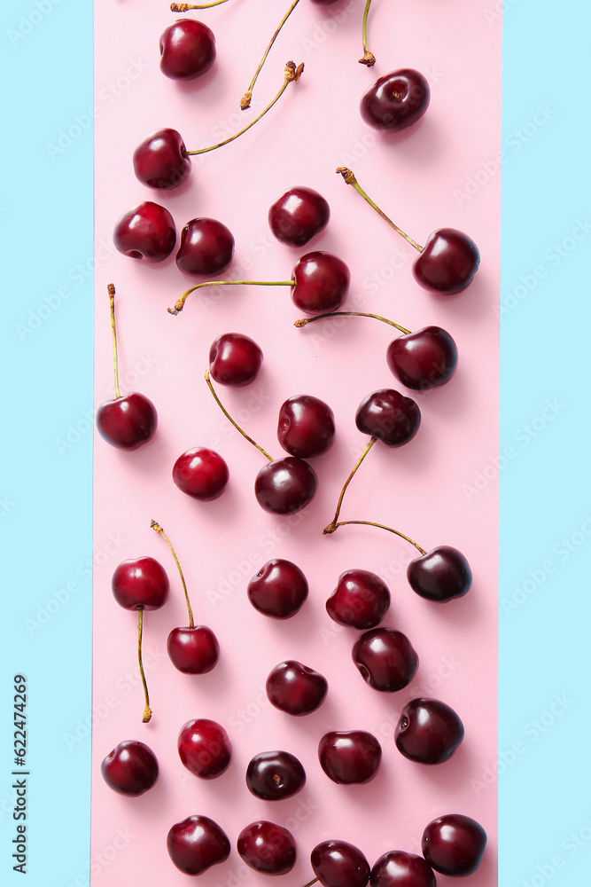 Many sweet cherries on colorful background