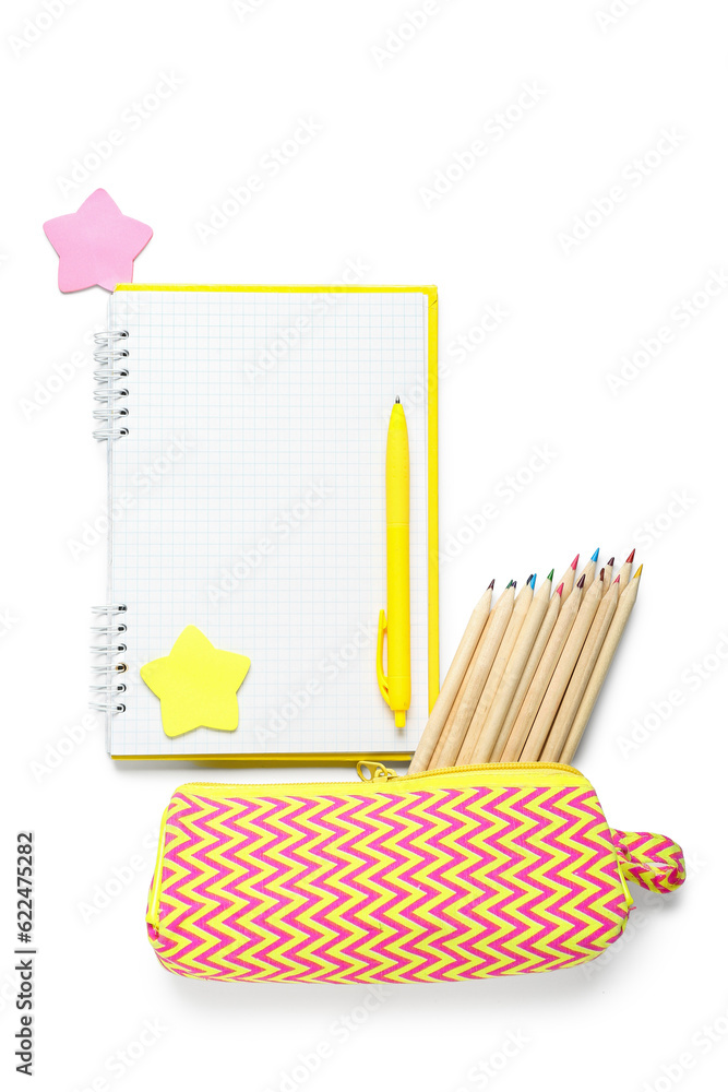 Blank notebook with different stationery isolated on white background