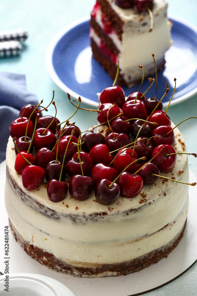 Tasty cherry cake on light background