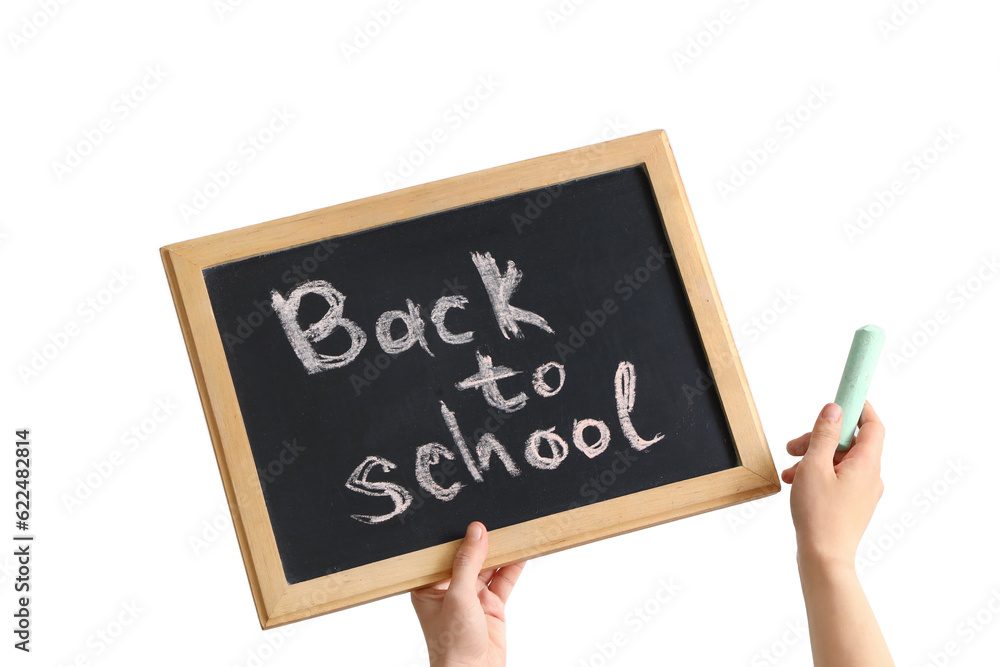 Female hands holding chalk and blackboard with text BACK TO SCHOOL isolated on white background