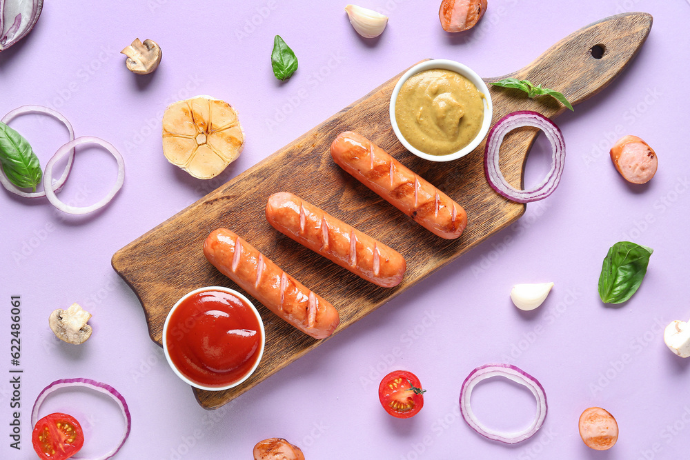 Wooden board with tasty grilled sausages and sauces on lilac background