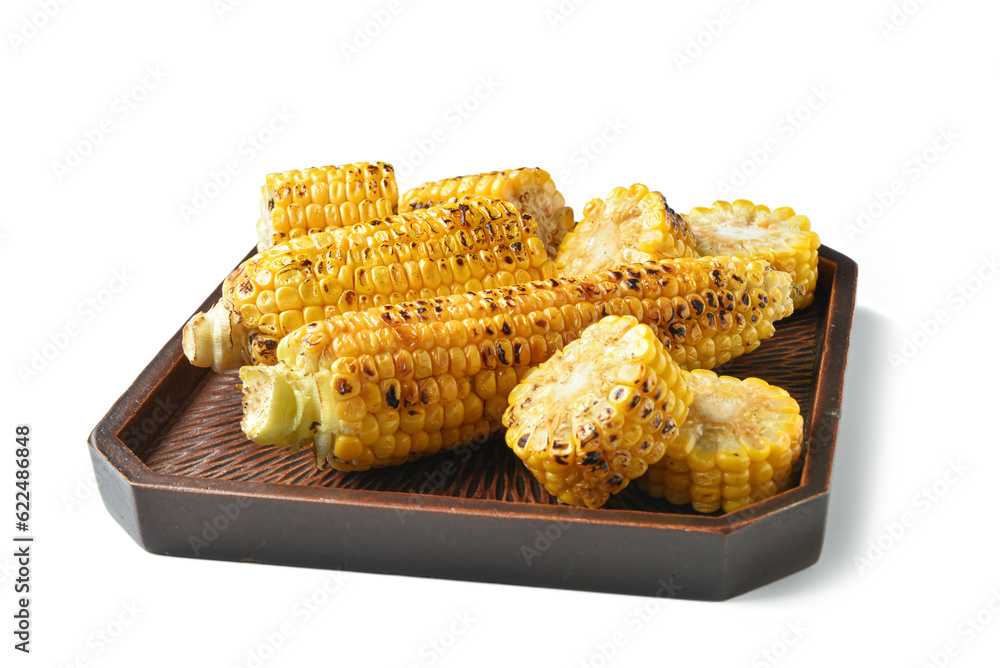 Tray with tasty grilled corn cobs on white background