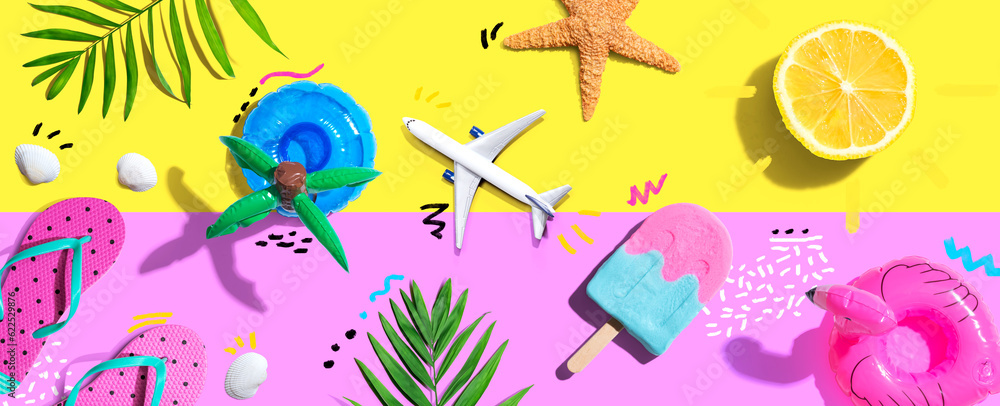 Summer concept with a airplane, a popsicle, flip flops and lemon sunshine - flat lay