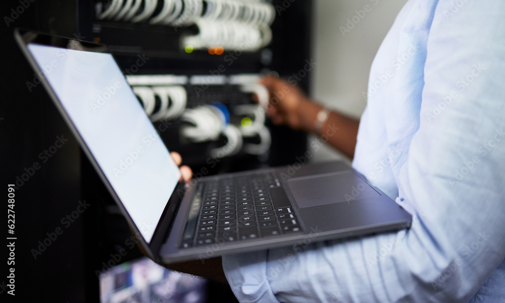 Server room, laptop and IT technician man with internet connection for software programming. Male en