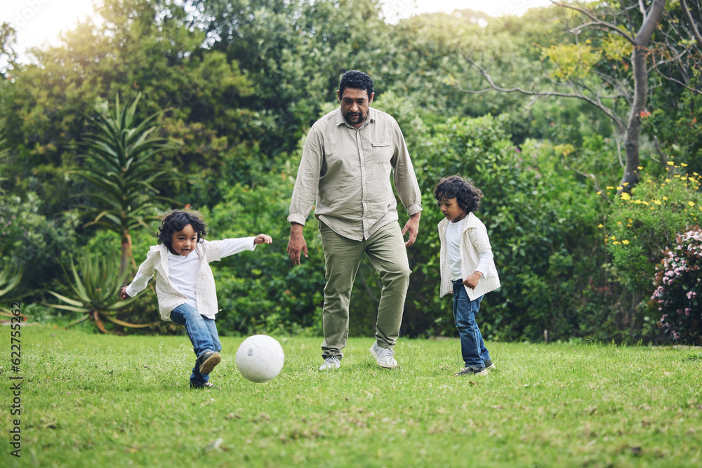 Happy, soccer and father with children in garden for playful, learning and sports. Summer, fitness a