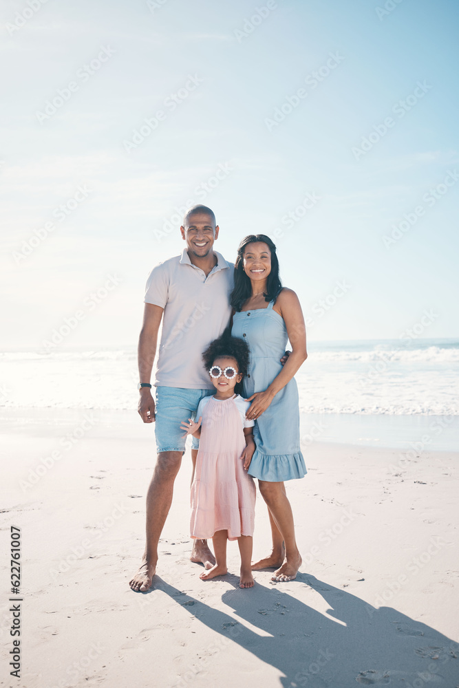 Summer, beach and portrait of happy family together at the sea or ocean bonding for love, care and h