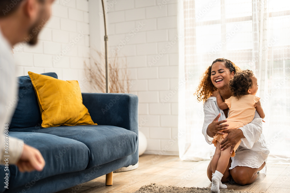 Caucasian family spending leisure free time together indoors in house. 