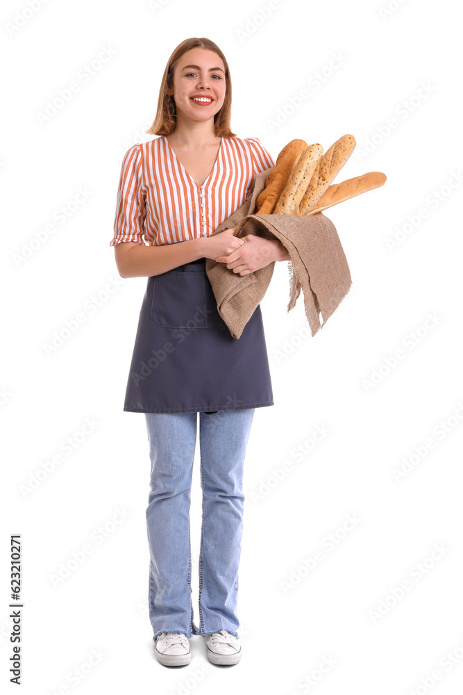 Female baker with fresh baguettes on white background