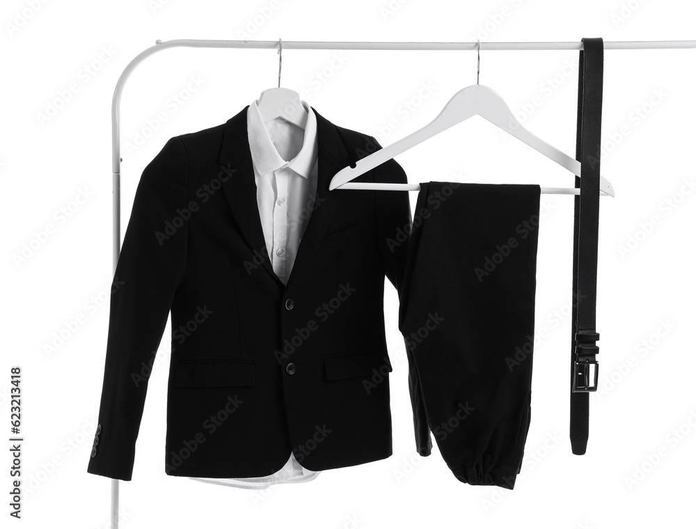 Rack with stylish black school uniform on white background