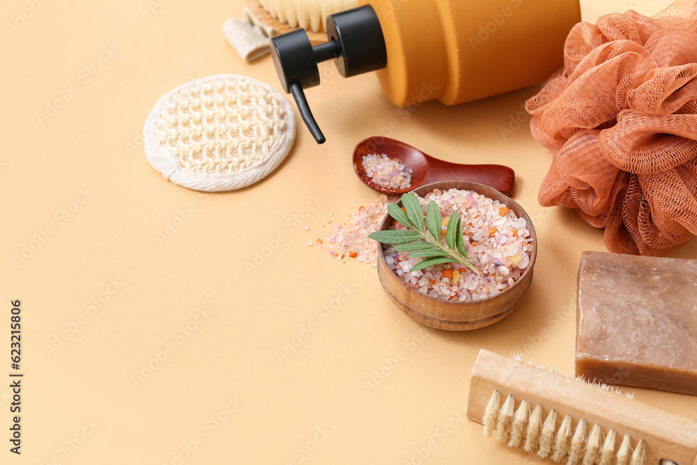 Bath supplies and cosmetics on color background