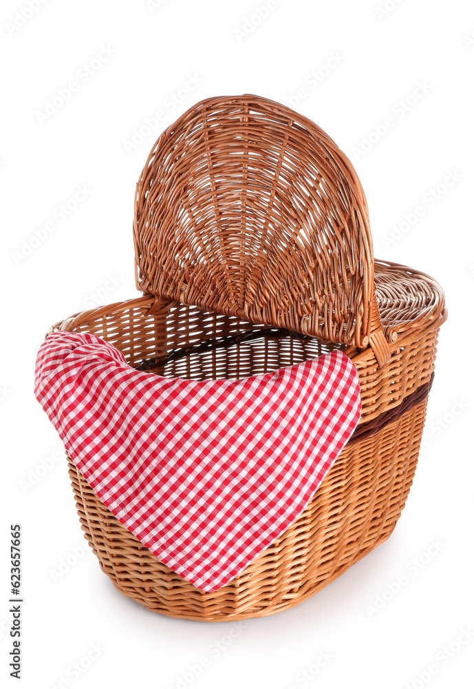 Wicker picnic basket with napkin isolated on white background