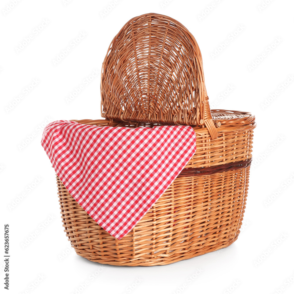 Wicker picnic basket with napkin isolated on white background