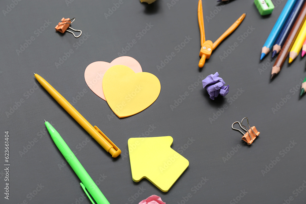 Calculator with different stationery on black chalkboard