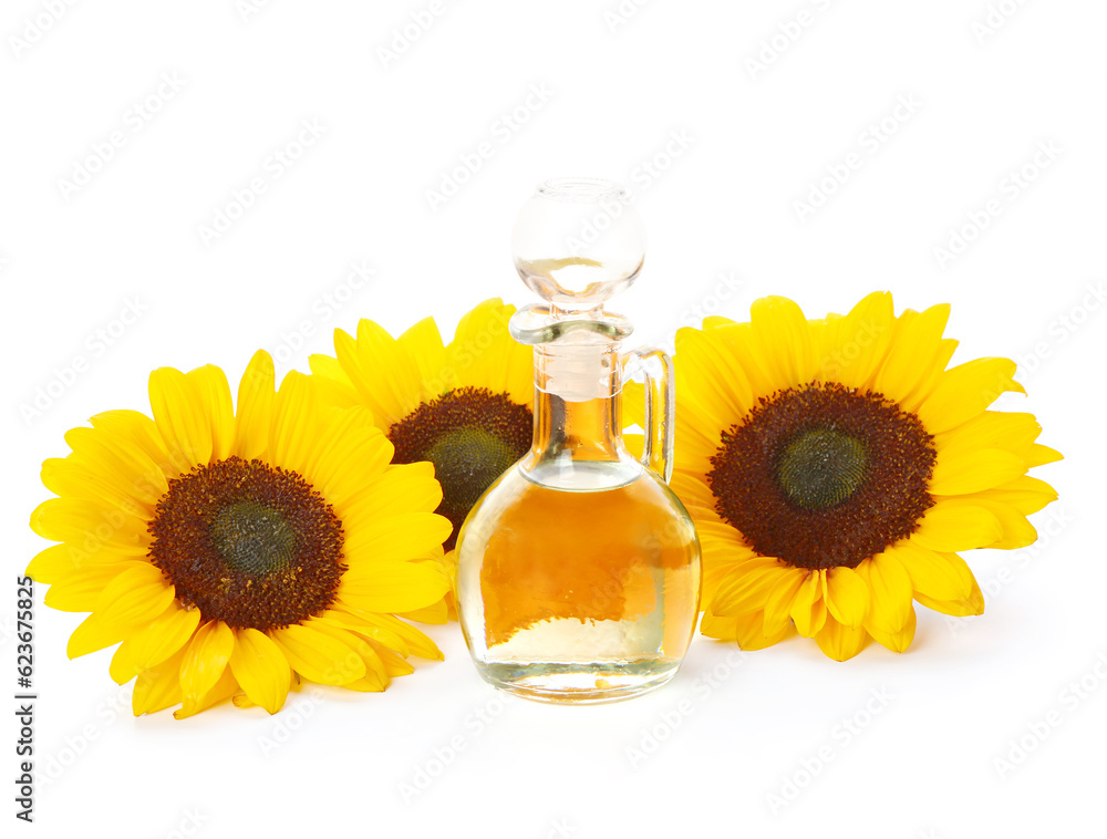 Decanter of sunflower oil on white background