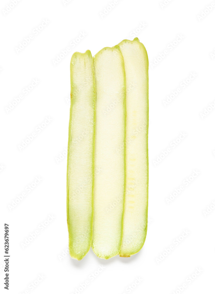 Slices of fresh green zucchini on white background