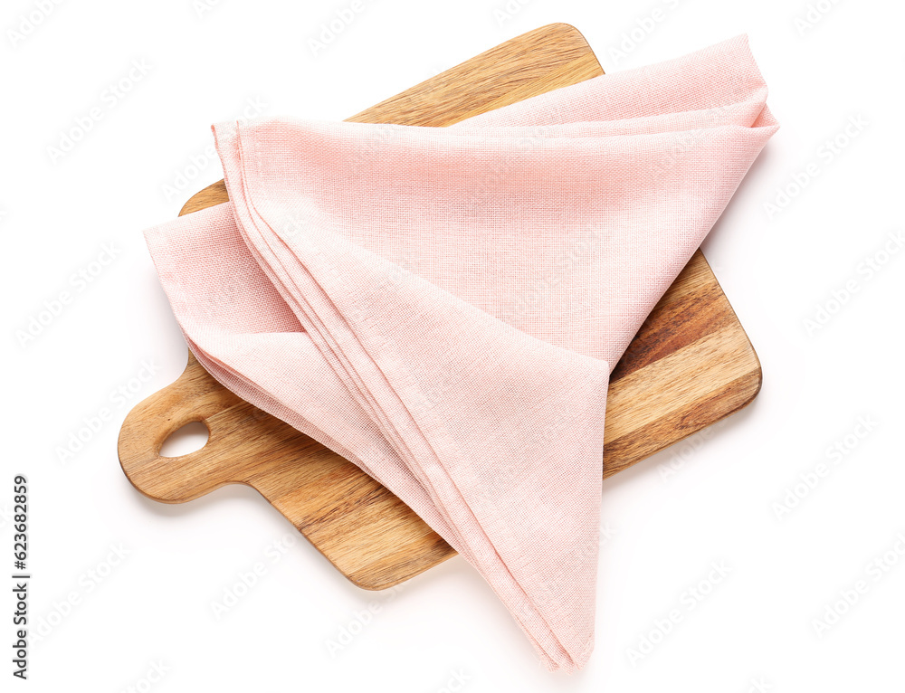 Wooden board and pink napkin on white background