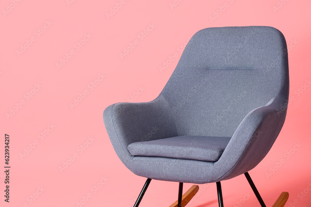 Rocking chair on pink background