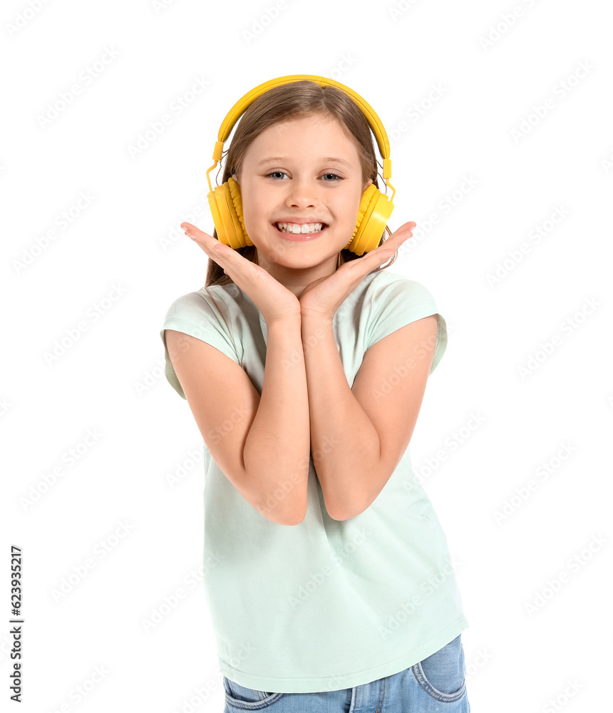 Little girl in headphones on white background