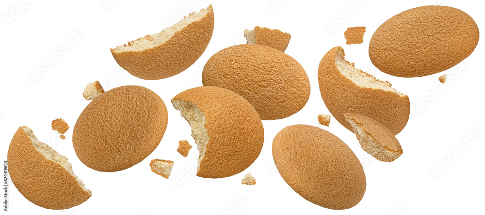 Falling sponge cakes, butter cookies isolated on white background