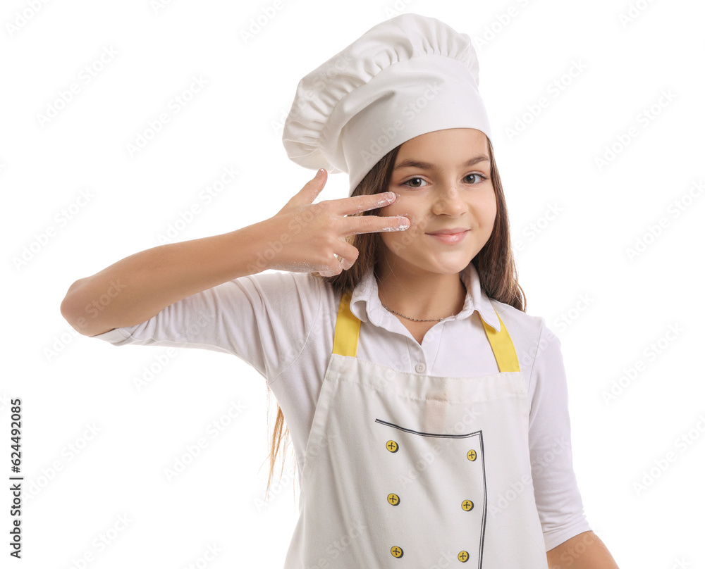 Little baker with flour on white background