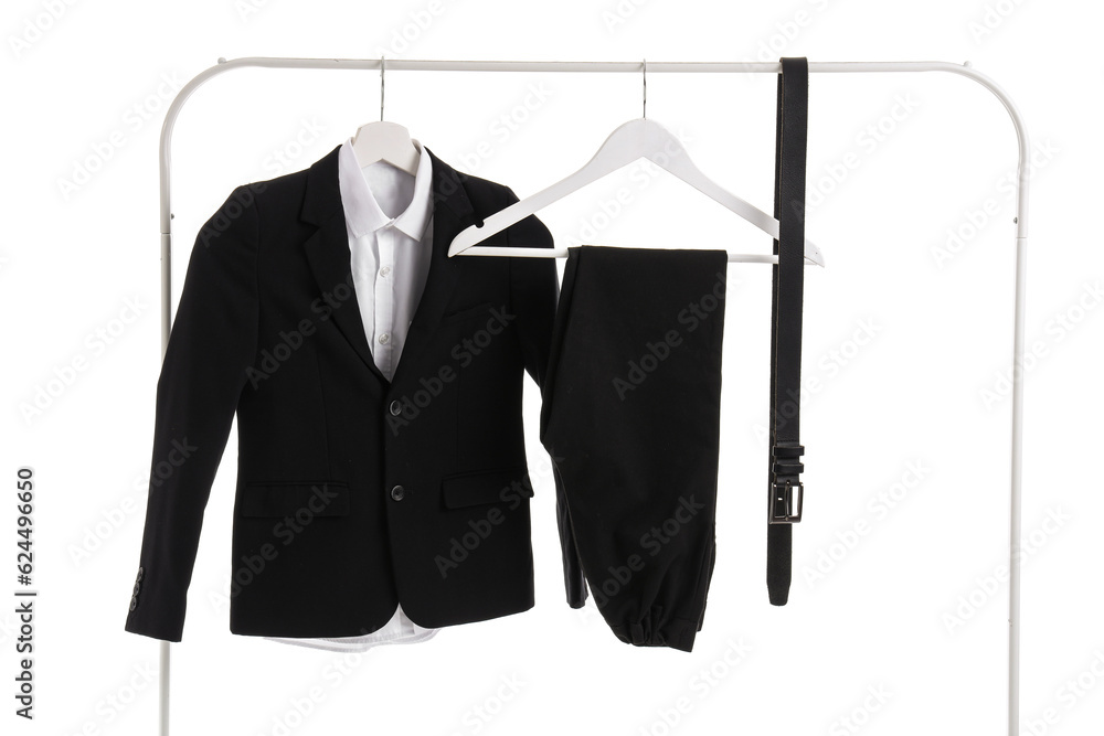 Rack with stylish black school uniform on white background